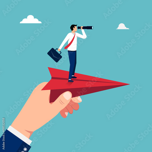 Big hand holding red paper plane with businessman standing on it concept illustration.