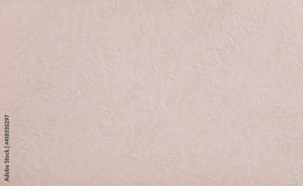 abstract background of crumpled pink wrapping paper abstract background of crumpled pink wrapping paper