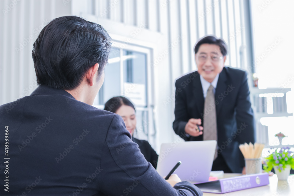asian group meeting business people. Senior tranning Asian Businessman. Group discussion. Happy faces of suitma. Working for success in office. asian group meeting business people. Senior tranning Asian Businessman. Group discussion. Happy faces of suitma. Working for success in office.