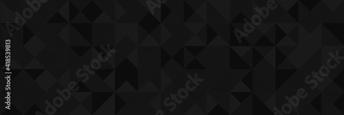 Abstract vector background from triangles. Background color is dark gray, black, gradient. Gradient pattern for design decoration. Conceptual background.