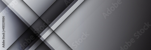 Dark gray carbon fiber wide background with black luminous lines and highlights. Wide modern, futuristic, technology, luxury abstract background. Dark wide banner. Vector illustration.