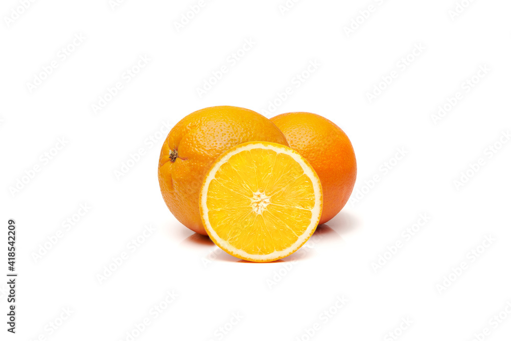 Whole and half sliced delicious and juicy ripe oranges isolated on white background. Three oranges. Whole and half sliced delicious and juicy ripe oranges isolated on white background. Three oranges.