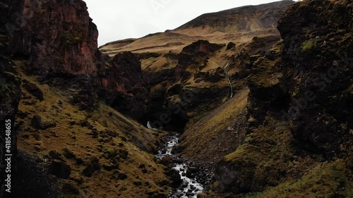 Árjánurfoss or Íráfoss, waterfall in Southern Iceland with lots of Iceland gulls or seagulls around in 4K aerial drone footage (arjanurfoss, irafoss) part2 photo