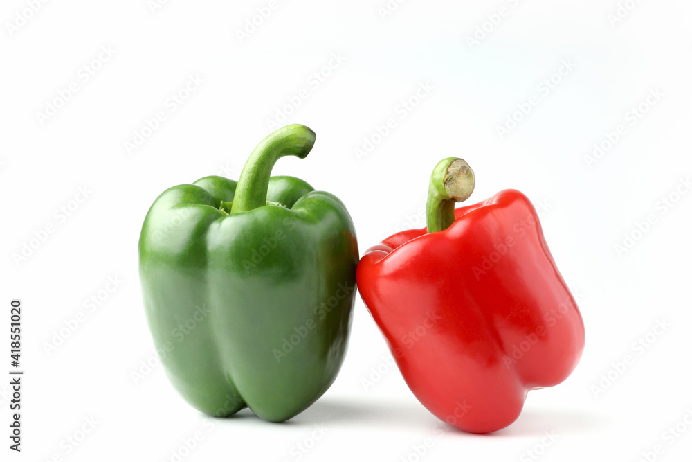 Closeup fresh sweet bell pepper red, and green isolated on white background with copy space. Closeup fresh sweet bell pepper red, and green isolated on white background with copy space.