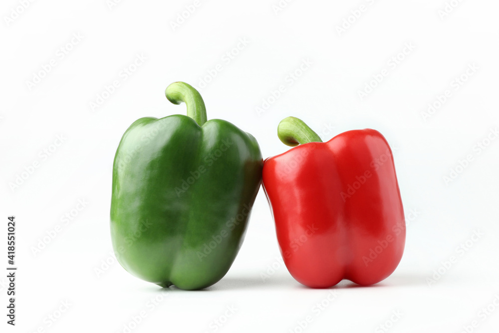 Closeup fresh sweet bell pepper red, and green isolated on white background with copy space. Closeup fresh sweet bell pepper red, and green isolated on white background with copy space.