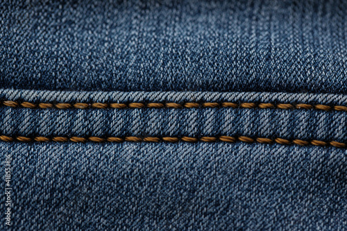 Blue Jeans Texture. Double stitching jeans. Macro photo