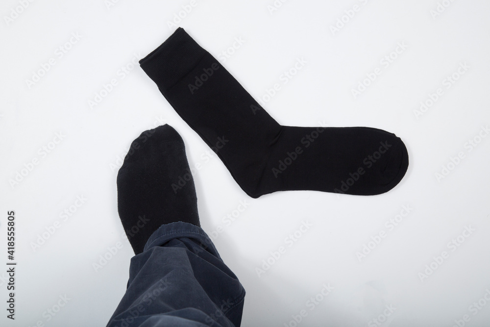 Black men's socks made of cotton on a white background. Black men's socks made of cotton on a white background.