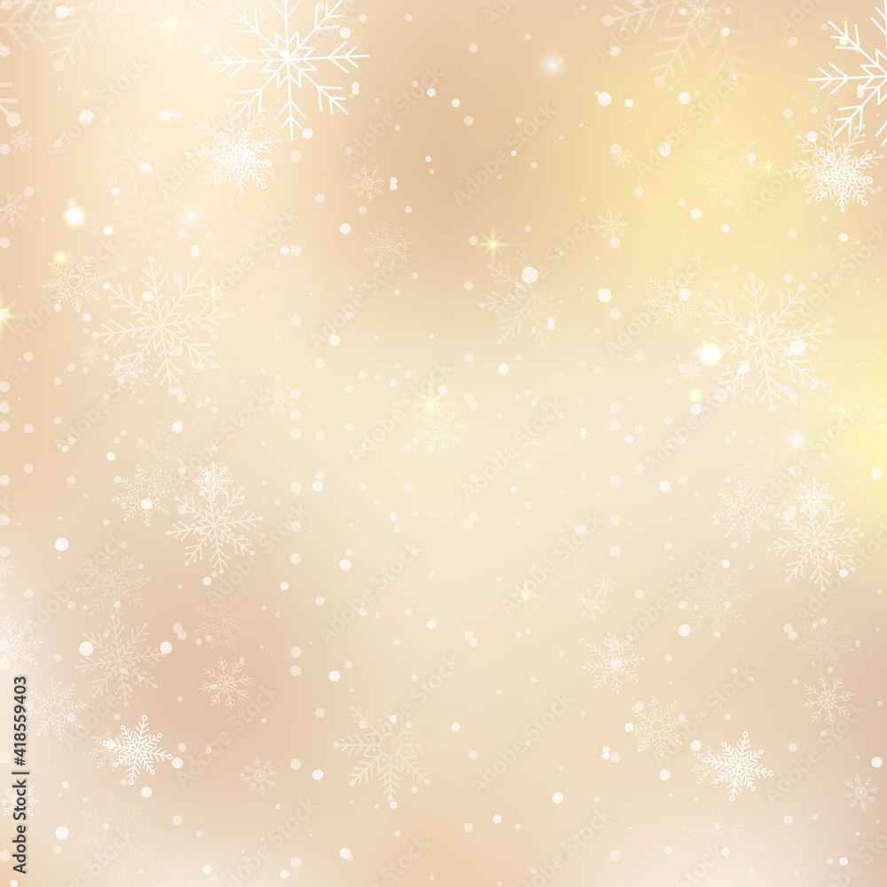 Gold bokeh background with snowflakes
