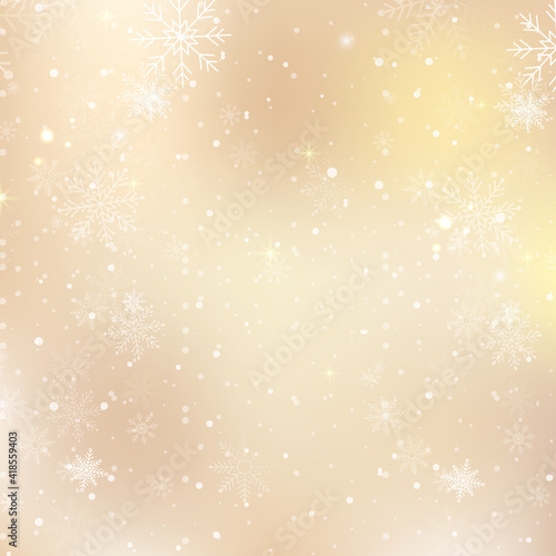 Gold bokeh background with snowflakes