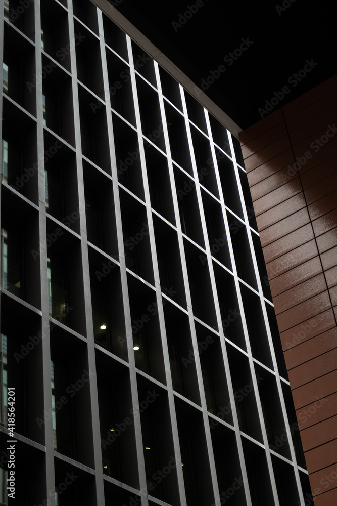 Office window. Modern glass building business center. Skyscraper in the city. Modern architecture. Building. Bottom view. Office building. Abstract architecture. New building. Office window. Modern glass building business center. Skyscraper in the city. Modern architecture. Building. Bottom view. Office building. Abstract architecture. New building.