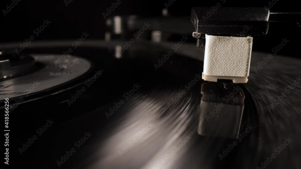 Vinyl record player in close-up - extreme macro shot Vinyl record player in close-up - extreme macro shot