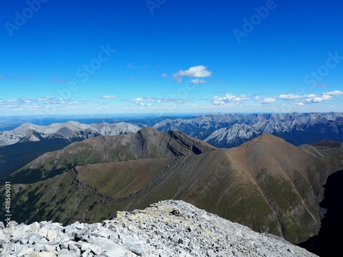 Fold rock on the slope with Prairie in the background at the summit of Mount Lougheed near Canmore Alberta Canada   OLYMPUS DIGITAL CAMERA photo