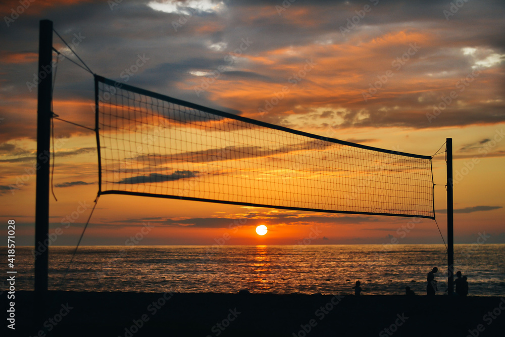 Volleyball Net On The Seabeach At Sunset Volleyball Net On The Seabeach At Sunset