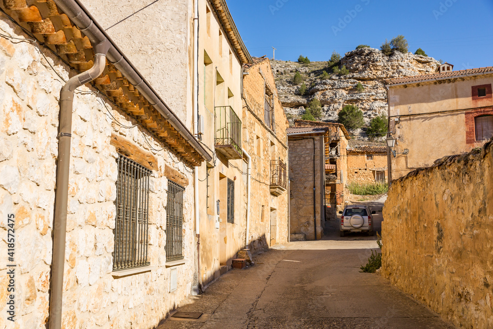 a street with traditional architecture in Castillejo de Robledo, province of Soria, Castile and Leon, Spain a street with traditional architecture in Castillejo de Robledo, province of Soria, Castile and Leon, Spain