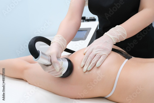 Vacuum massage device. Vacuum massage of the buttocks and legs.