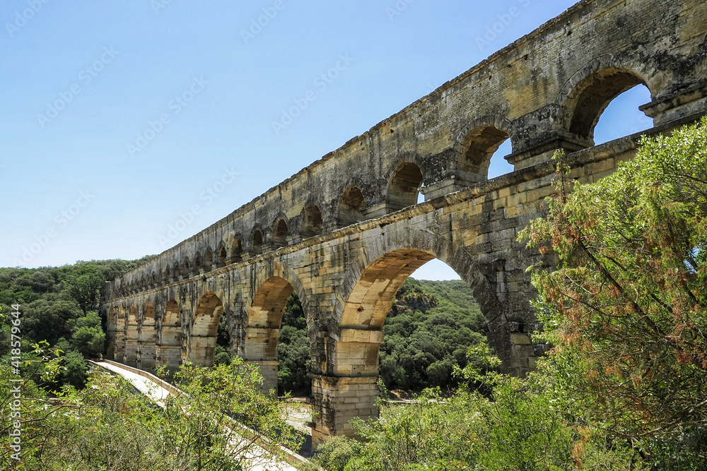 The Pont du Gard is an ancient Roman aqueduct bridge built in the first century AD