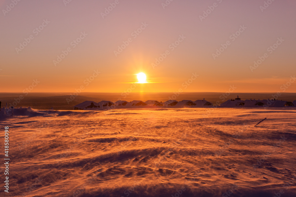 Winter landscape at sunrise in Finnish Lapland