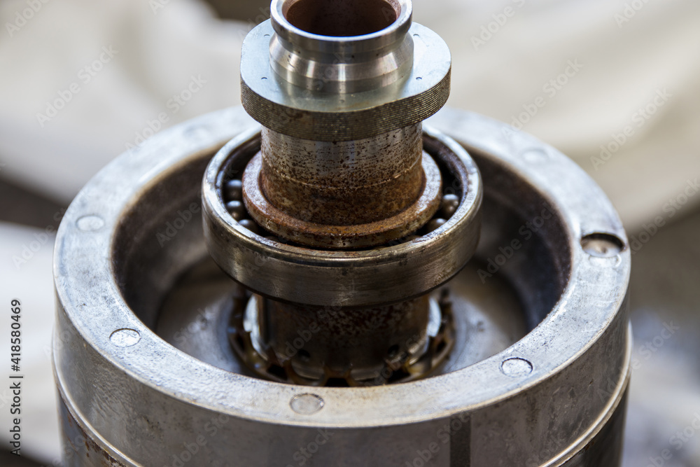 Rotor of IPM-SynRM (Internal Permanent Magnet Synchronous Reluctance Motor) with corrosial damage caused by coolant leak. EV repair concept. Rotor of IPM-SynRM (Internal Permanent Magnet Synchronous Reluctance Motor) with corrosial damage caused by coolant leak. EV repair concept.