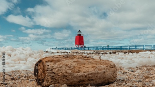 Michigan lighthouse in winter. Charlevoix Michigan, Up north lake. Icey wintertime.  photo