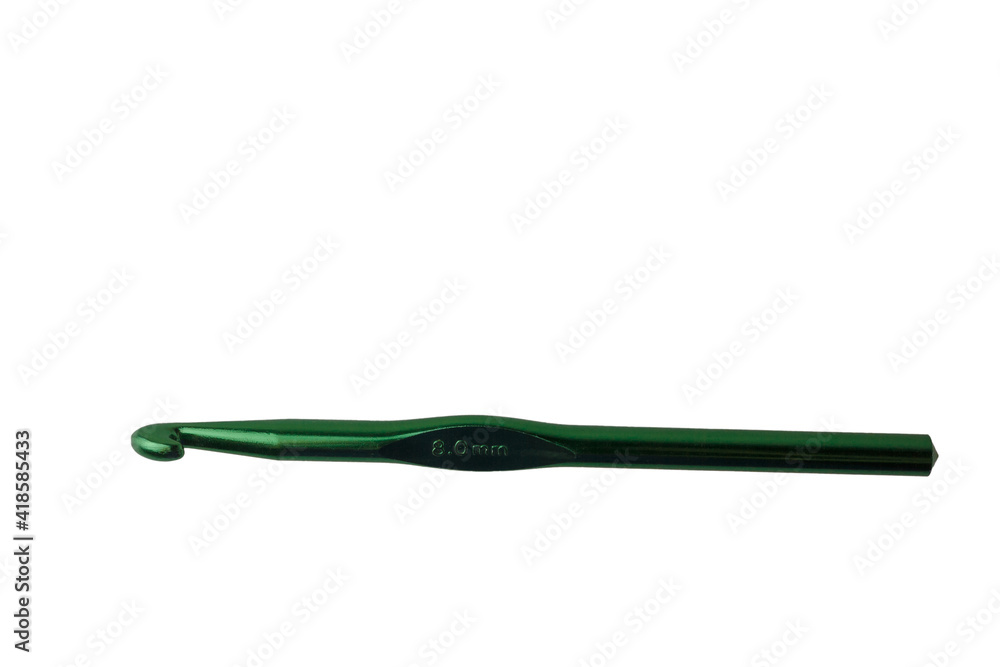 8 mm metallic green crochet hook isolated on white background. Tool for crocheting, handmade hobbies, handwork, craft, leisure 8 mm metallic green crochet hook isolated on white background. Tool for crocheting, handmade hobbies, handwork, craft, leisure