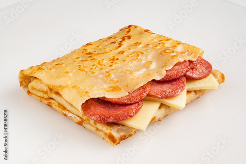 pancake stuffed with sausage and cheese,