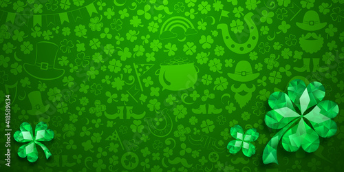 Background on St. Patrick's Day made of crystal clover leaves and other symbols in green colors