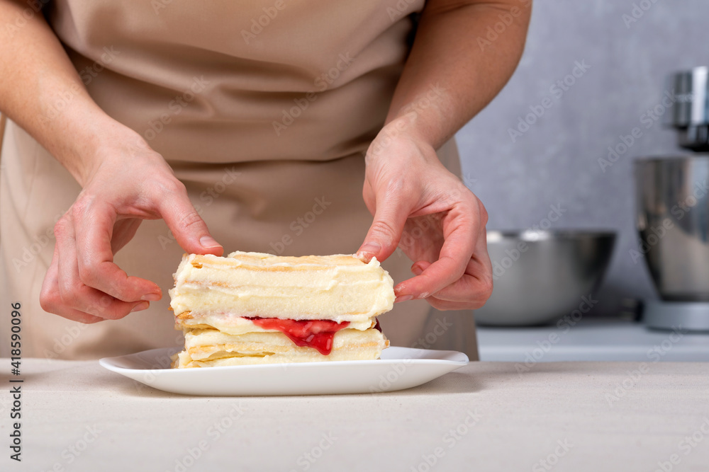 Process of making pie with vanilla and fruit filling. Pastry chef is preparing cake. Process of making pie with vanilla and fruit filling. Pastry chef is preparing cake.