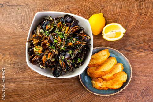 ready-made mussels in a large plate 