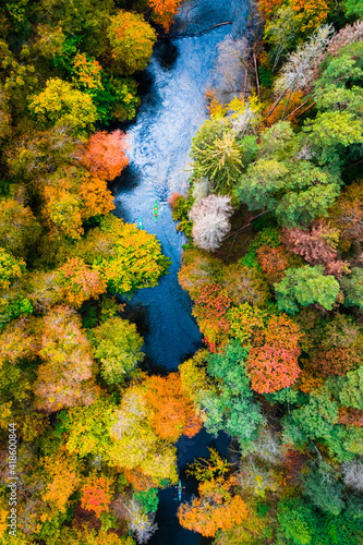 Kayaking on river. Sport in autumn. Aerial view of Poland