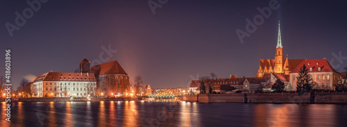 Cathedral of St. John the Baptist, philological faculty, Roman Catholic Church in Wroclaw on the Odra River, illuminated at night.
