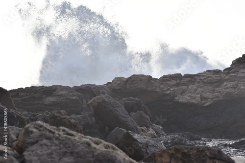 The sea demonstrating its power against the cliffs