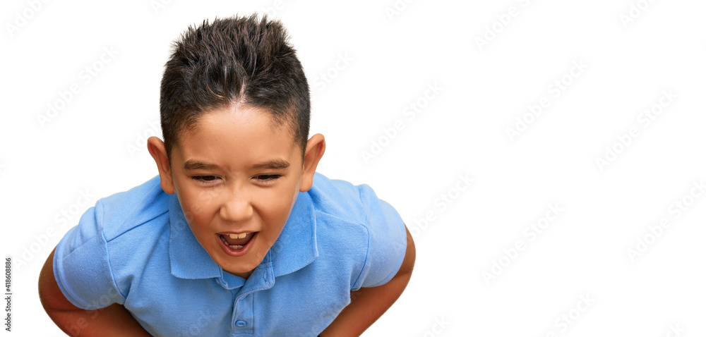 Little boy hispanic kid wearing casual clothes smiling and laughing hard out loud because funny crazy joke with hands on body.