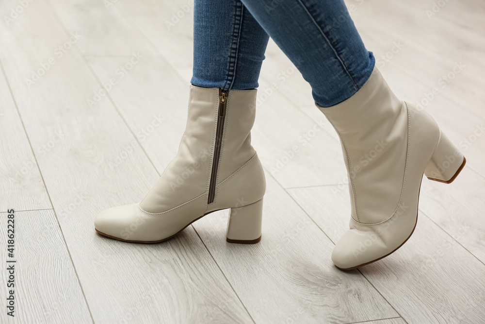 Woman wearing stylish leather shoes indoors, closeup Woman wearing stylish leather shoes indoors, closeup