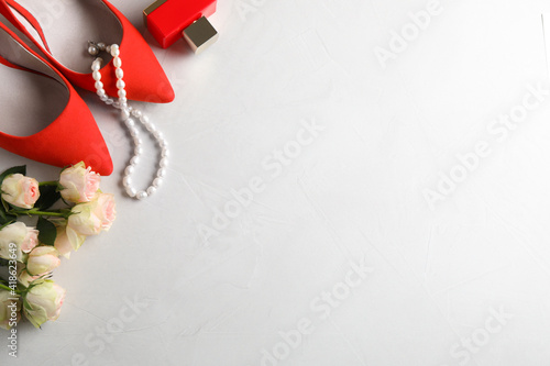 Wallpaper Mural Composition with high heel shoes on white background, flat lay. Space for text Torontodigital.ca