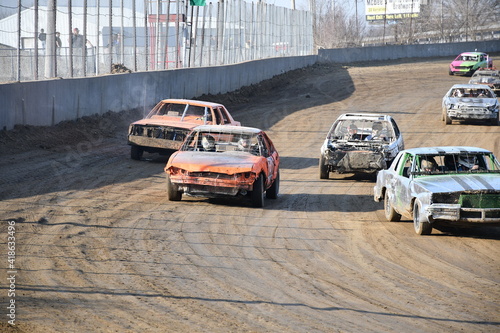 Race Cars on a Dirt Track photo