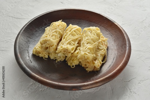 Roti Jala or lace pancake is Malaysian traditional food photo