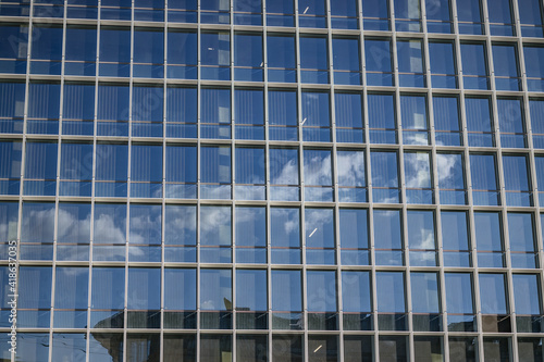 blue sky on building glass