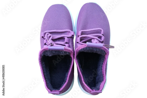 Purple sneakers or sports shoes on white background