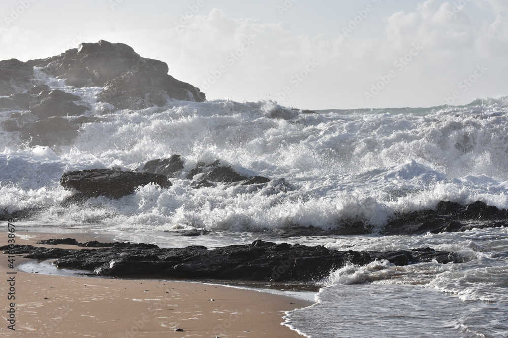 The sea demonstrating its power against the cliffs The sea demonstrating its power against the cliffs