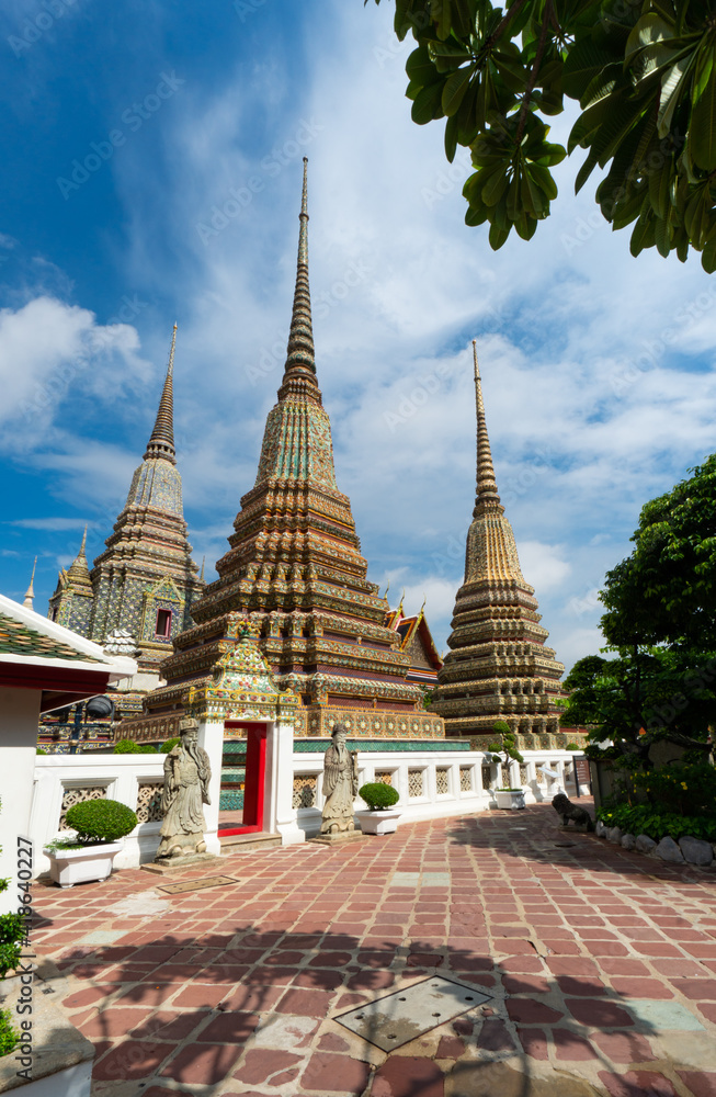 The Temple  of  The Reclining Buddha, Bangkok, Thailand under blue sky