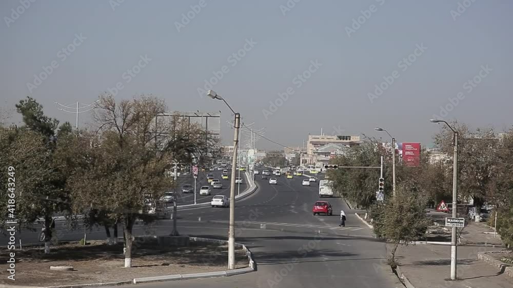 traffic in the city . cars on city . Asian city . noisy traffic. city road . car road. asian traffic . uzbekistan. traffic in the city . cars on city . Asian city . noisy traffic. city road . car road. asian traffic . uzbekistan.