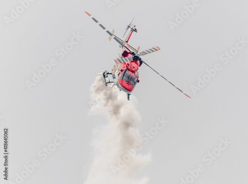 Indian Air Force Sarang helicopter air display team flying HAL Dhruv aircraft. photo