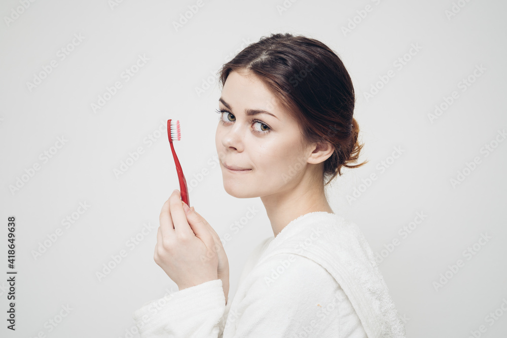 pretty woman in white coat toothbrush health hygiene pretty woman in white coat toothbrush health hygiene