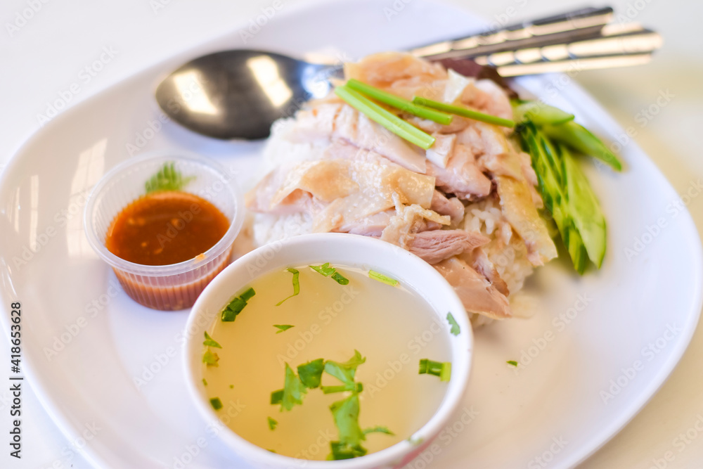 Close-up chicken rice on a white table
