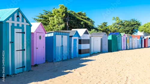 Wooden beach cabins on the Oleron island in France, colorful huts
 photo