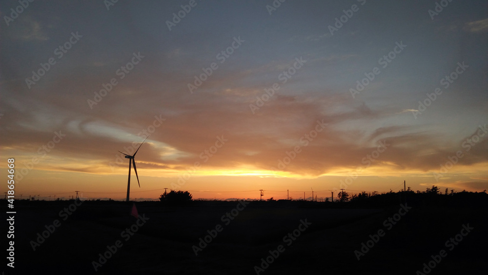 Windmill in sunset