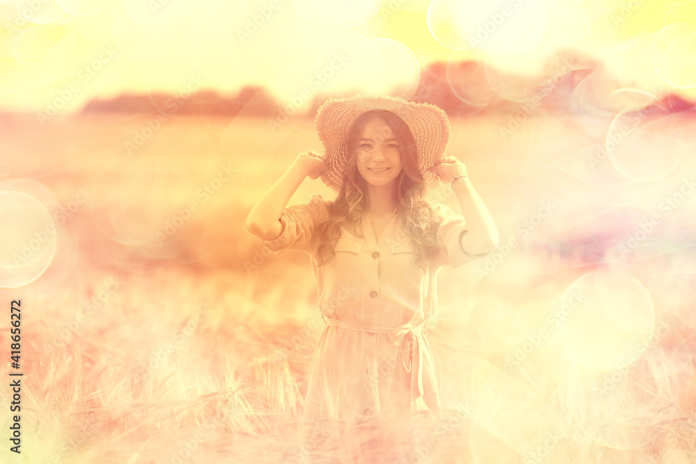 happy young adult model in yellow wheat field / summer happiness concept girl in the field