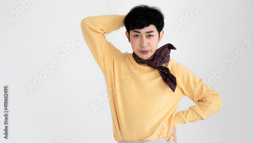 Portrait of transgender man LGBTQ being as woman gesture posing with gorgeous cheerful manner and self-confidence isolated on white background