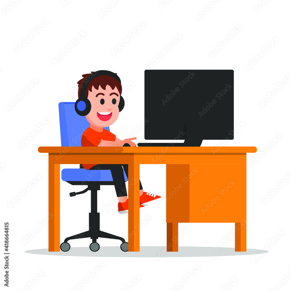 a boy playing games on the computer and wearing headphones a boy playing games on the computer and wearing headphones