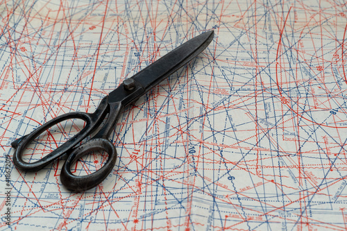 Obraz na plátně Old scissors, a base that is used for sewing a certain material